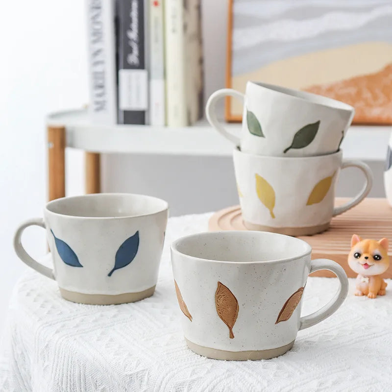 Blue Yellow Brown And Green Leaves On Craft Style Pottery Ceramic Mugs  With Exposed Base