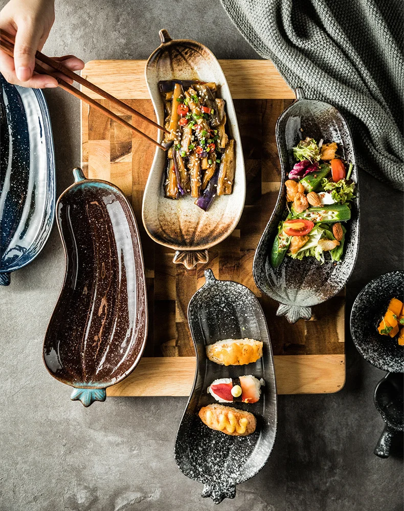 Eating Food And Side Dishes Out Of Decorative Ceramic Eggplant Shaped Serveware