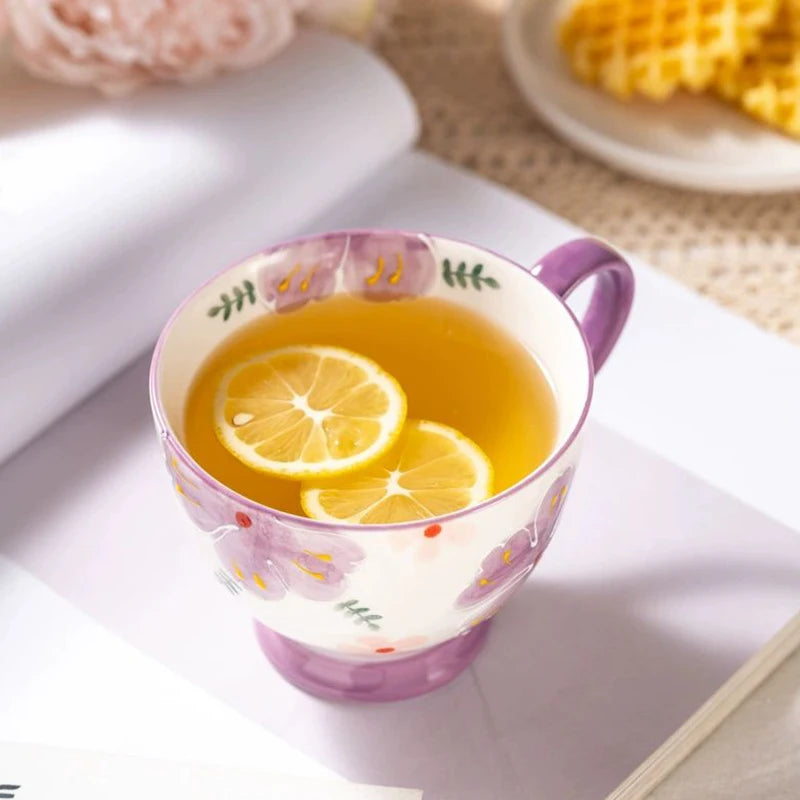 Lemon Tea In Pretty Purple Tea Cup With Painted Petals Flower Pattern