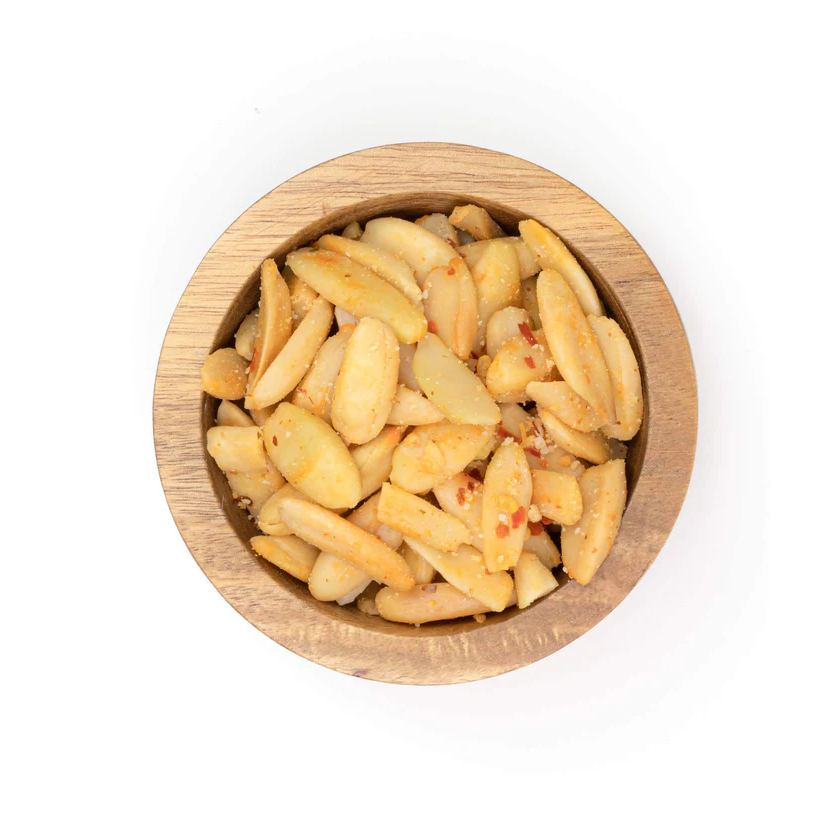 Superfood Pili Nuts With Spicy Chili Pepper Wood Bowl Of Pili Hunters Healthy Snack