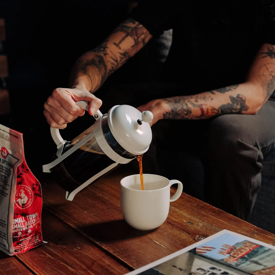 French Press Pouring Small Batch Organic Coffee Red Rooster Brand