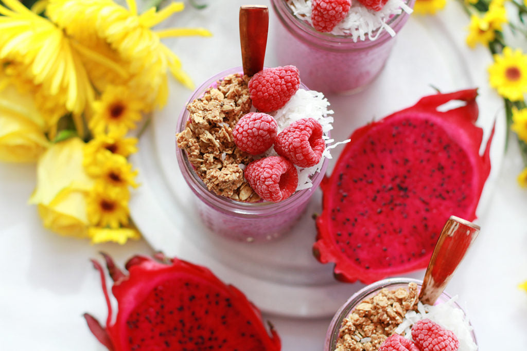 Pink Pitaya And Raspberry Coconut Chia Pudding Sweetened With Madhava Amber Agave Syrup Topped With Granola Coconut And Red Raspberries