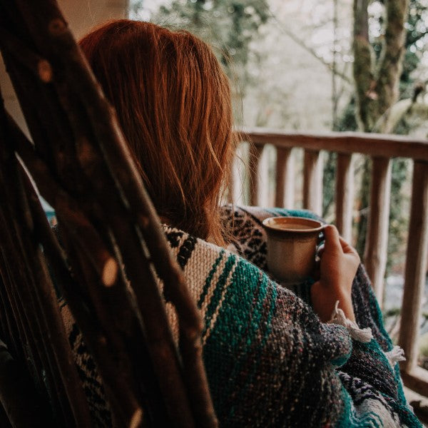 Woman Outdoors On Porch Enjoying Organic Tony's Coffee Espresso From Terra Powders